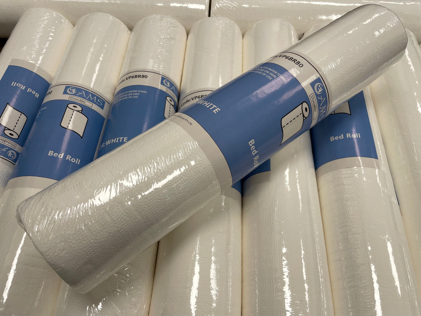 AMS Bed Sheet Rolls 57cm X 80m Proforated Ctn (6 Rolls)